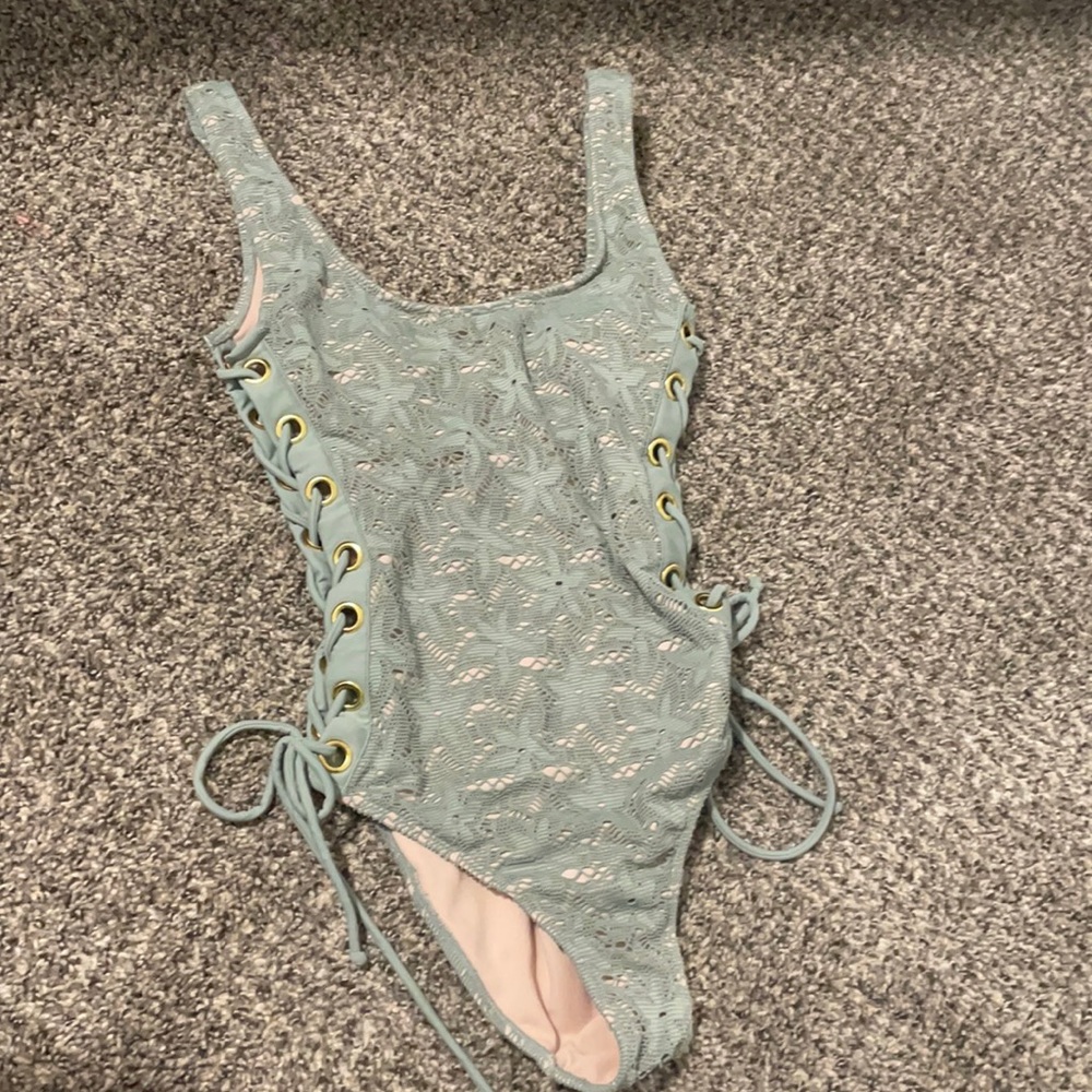 One piece bathing suit! Super cute tied sides!